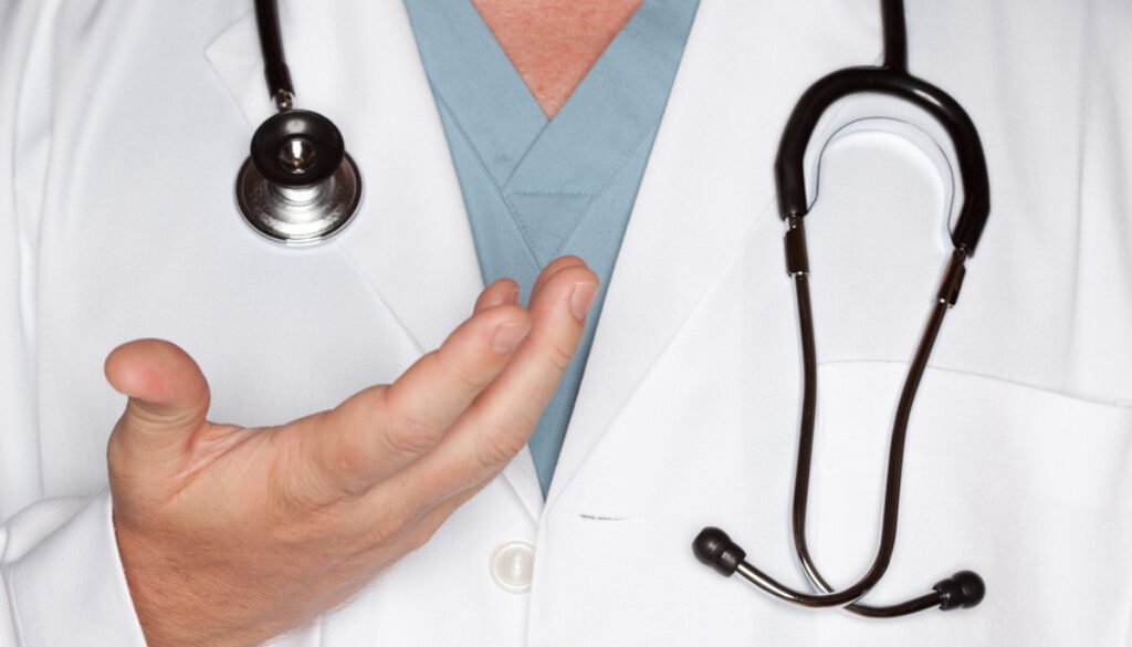 Male Doctor Hand Abstract with Lab Coat and Stethoscope.