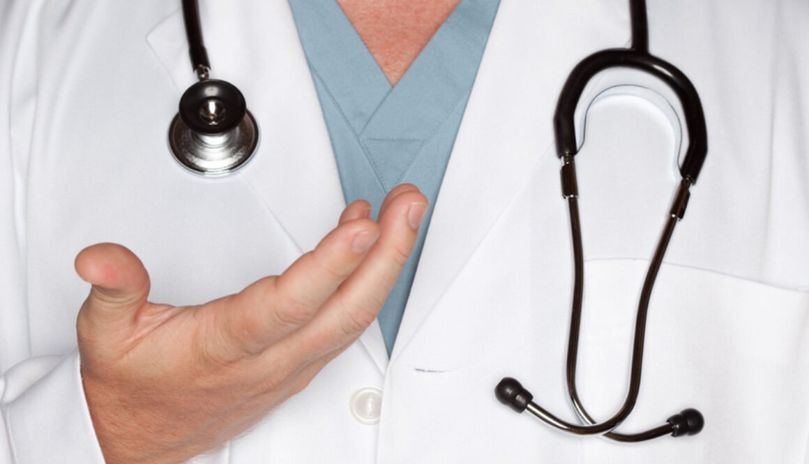 Male Doctor Hand Abstract with Lab Coat and Stethoscope.