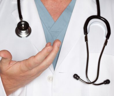 Male Doctor Hand Abstract with Lab Coat and Stethoscope.